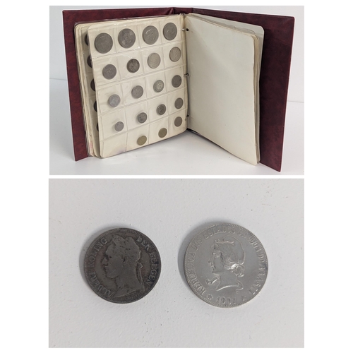 250 - An album of mixed World coins to include 1907 Brazil 2000 Reis, 1922 Albert I Belgian Congo 1 Franc,... 