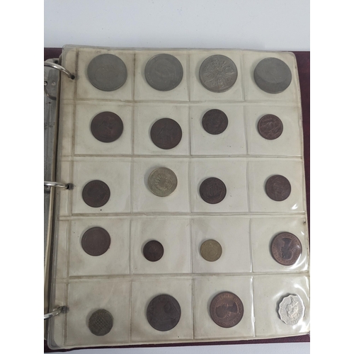 250 - An album of mixed World coins to include 1907 Brazil 2000 Reis, 1922 Albert I Belgian Congo 1 Franc,... 