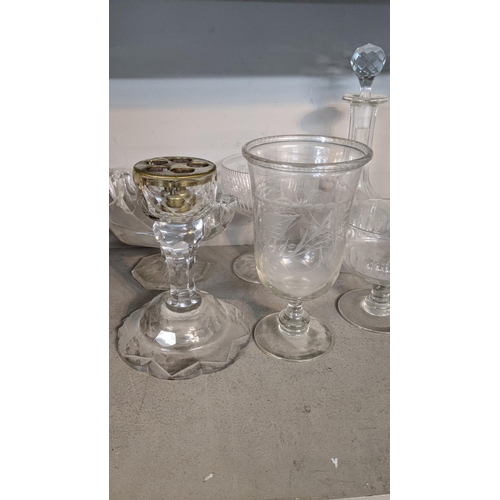 251 - A mixed lot of glassware to include late Victorian and later items to include a engraved glass celer... 