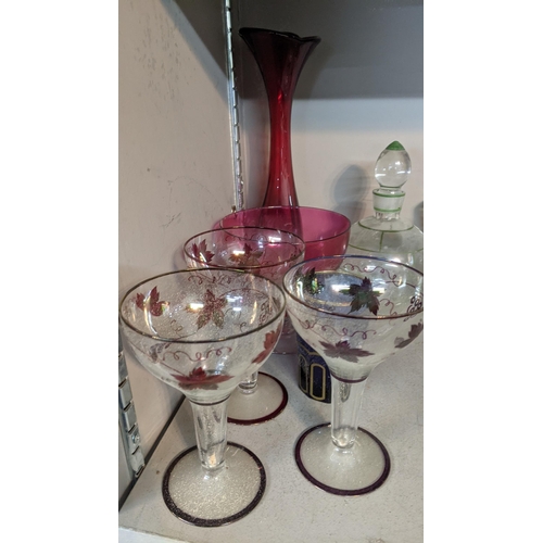 251 - A mixed lot of glassware to include late Victorian and later items to include a engraved glass celer... 