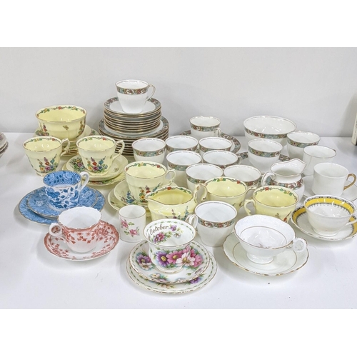 252 - A mixed lot of cups and saucers to include a Royal Albert flowers of the month series October togeth... 