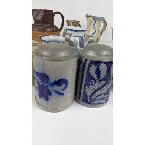 253 - A collection of art pottery to include a 19th century Stiff & Sons jug, two German tankards and othe... 