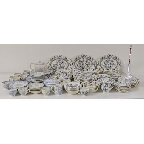 254 - A large collection of blue and white teal dinner services, to include Johnson brothers service and o... 