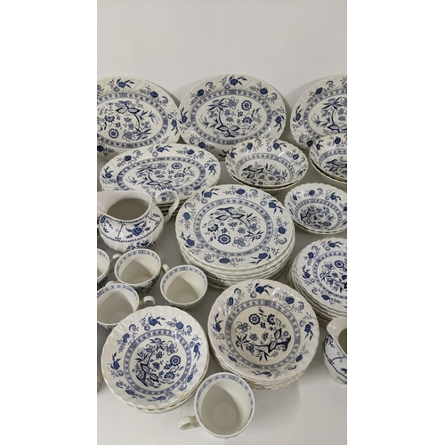 254 - A large collection of blue and white teal dinner services, to include Johnson brothers service and o... 