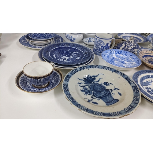 255 - Mixed blue and white porcelain to include an 18th century faience plate, Royal Lily pattern cup with... 