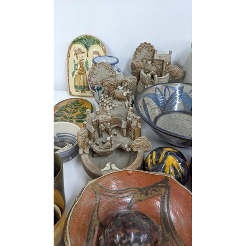 258 - A mixed lot of studio art pottery to include various jugs, vases, bowls and other items
Location:A3M