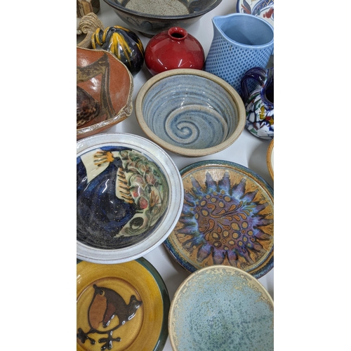 258 - A mixed lot of studio art pottery to include various jugs, vases, bowls and other items
Location:A3M