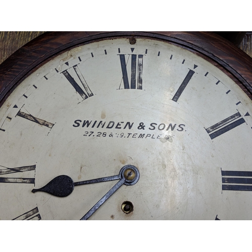 262 - A late 19th century 12 inch dial clock in an oak case, the dial inscribed 'Swinden & Sons 27.28 & 29... 