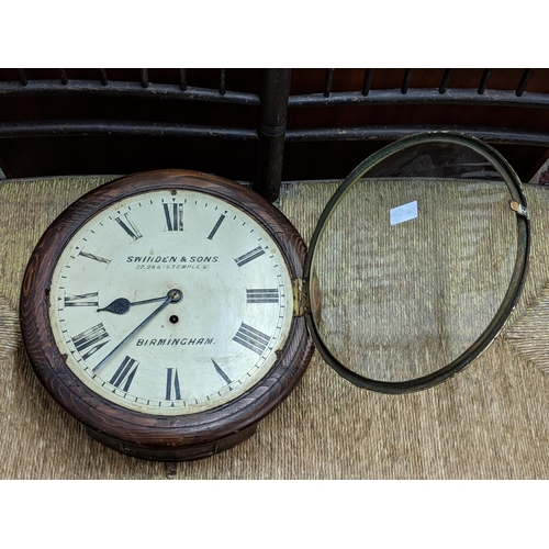 262 - A late 19th century 12 inch dial clock in an oak case, the dial inscribed 'Swinden & Sons 27.28 & 29... 