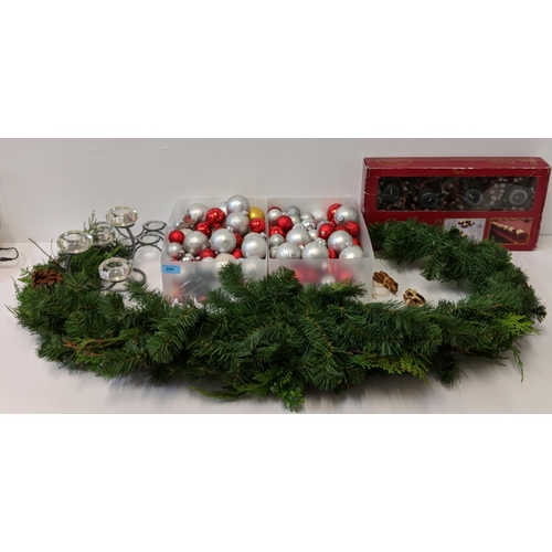 266 - Christmas decorations to include baubles, candles, candlesticks, wreath and other items
Location:2.4