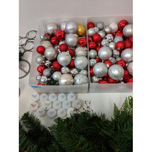 266 - Christmas decorations to include baubles, candles, candlesticks, wreath and other items
Location:2.4