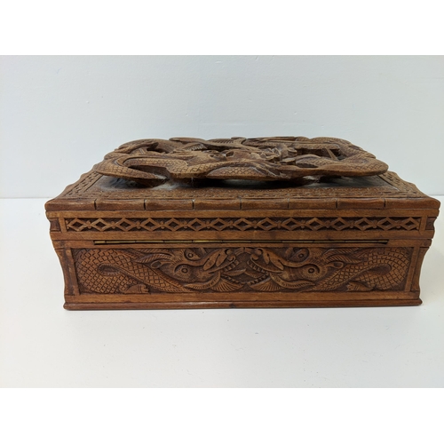 267 - A wood jewellery box carved with a dragon, a Japanese carved bamboo walking stick and others
Locatio... 