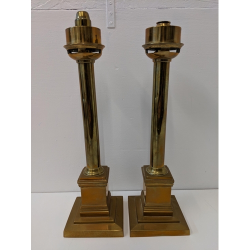 269 - A pair of brass candlesticks lamps with etched glass shades.
Location:A1F