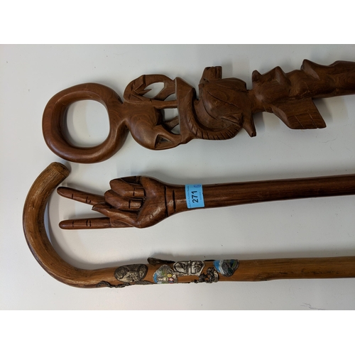 271 - Six carved and wooden walking sticks to include African and European examples Location:BWR