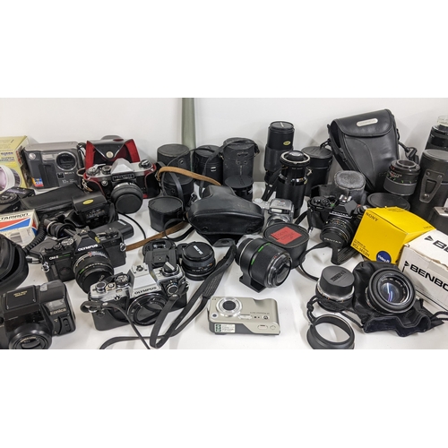 318 - Mixed cameras and accessories to include Olympus, Sony, Pentax, mixed lenses and other items
Locatio... 