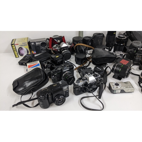 318 - Mixed cameras and accessories to include Olympus, Sony, Pentax, mixed lenses and other items
Locatio... 