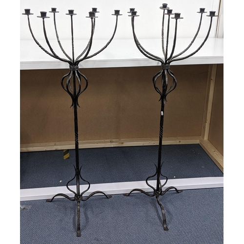 319 - A pair of wrought iron seven branch floor standing candlesticks, 128h
Location:ROS/A1F