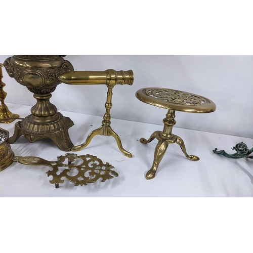 326 - Mixed brassware to include a cast Grecian style twin handled table lamp, goffering iron and other it... 