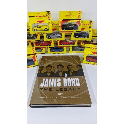 328 - A mixed lot to include Shell classic sports car collection, James Bons the legacy hard back book, a ... 