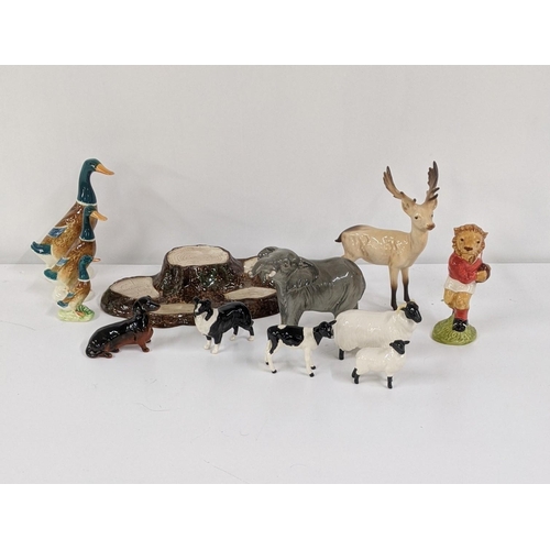 334 - Mixed Beswick animal models to include three ducks, a sheep dog, elephant and others
Location:9.3