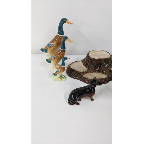 334 - Mixed Beswick animal models to include three ducks, a sheep dog, elephant and others
Location:9.3