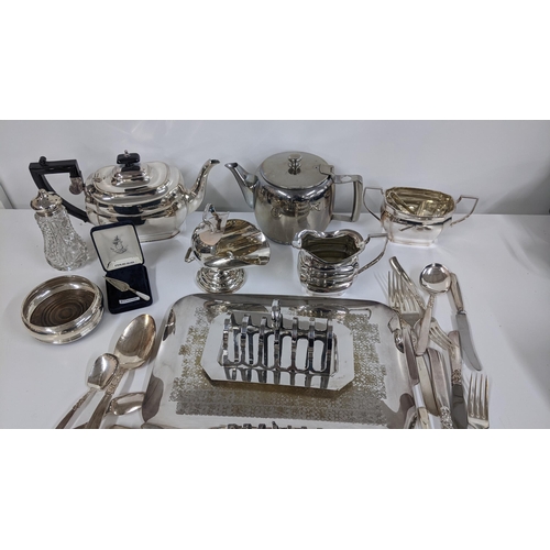 345 - Mixed silver plate to include a tea set, toast rack, cutlery etc. together with a silver coaster, si... 