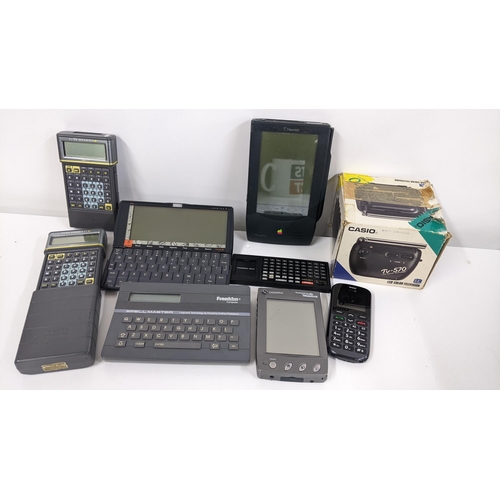 348 - Mixed electrical items to include an Apple Newton message pad, Psion series 5, Seiko UC-3100 and oth... 