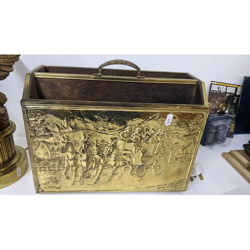 370 - Mixed brass fireside items to include a coal bucket, kettle, fireside implements and other items
Loc... 