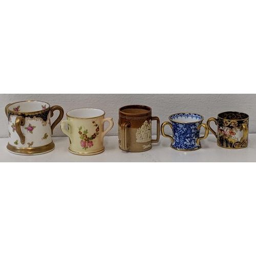 391 - A collection of twenty six 19th and 20th century jugs to include Royal Crown Derby & Royal Doulton C... 