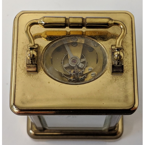 392 - An Angelus miniature brass cased carriage clock.
Location:CAB1