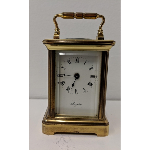 392 - An Angelus miniature brass cased carriage clock.
Location:CAB1