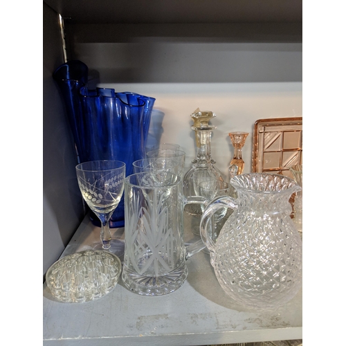 50 - A large quantity of glassware to include domestic glasses, bowls, decanters and other items
Location... 