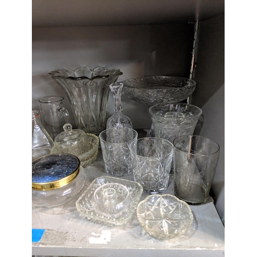 50 - A large quantity of glassware to include domestic glasses, bowls, decanters and other items
Location... 