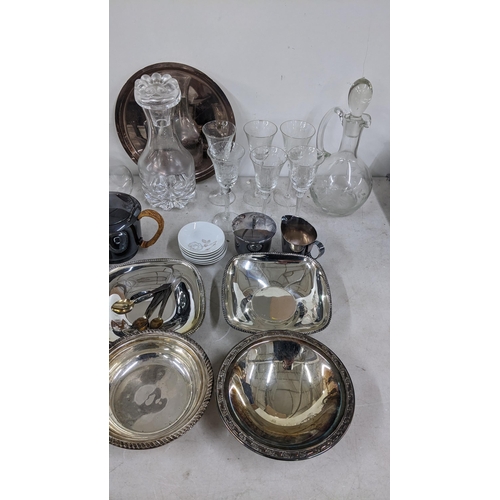 66 - THIS LOT IS WITHDRAWN
A mixed lot to include a German coffee set, silver plate, glassware, and a 19t... 