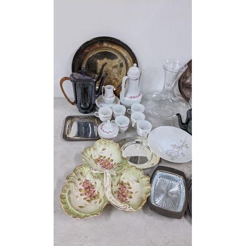 66 - THIS LOT IS WITHDRAWN
A mixed lot to include a German coffee set, silver plate, glassware, and a 19t... 