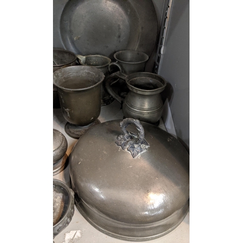 70 - 18th century and later pewter items to include a meat cover, tankards, salt and pepper shakers and o... 