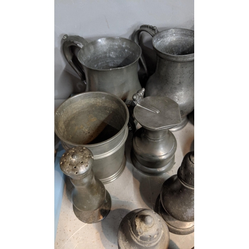 70 - 18th century and later pewter items to include a meat cover, tankards, salt and pepper shakers and o... 