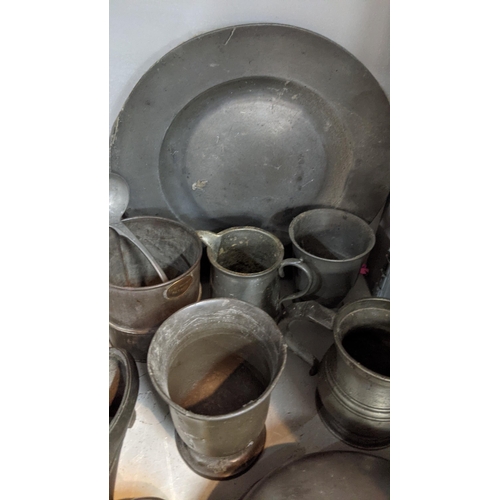 70 - 18th century and later pewter items to include a meat cover, tankards, salt and pepper shakers and o... 