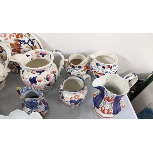 80 - A selection of mainly 19th century pottery to include a scalloped shaped cachepot, Masons jugs and o... 