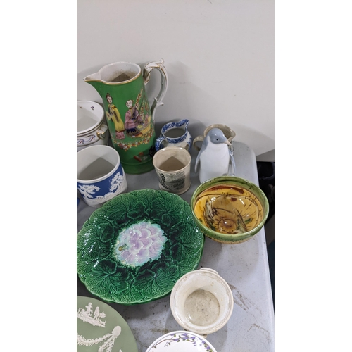 81 - A mixed lot to include a Majolica begonia plate, dale Hall pottery jug and other items
Location:9.2