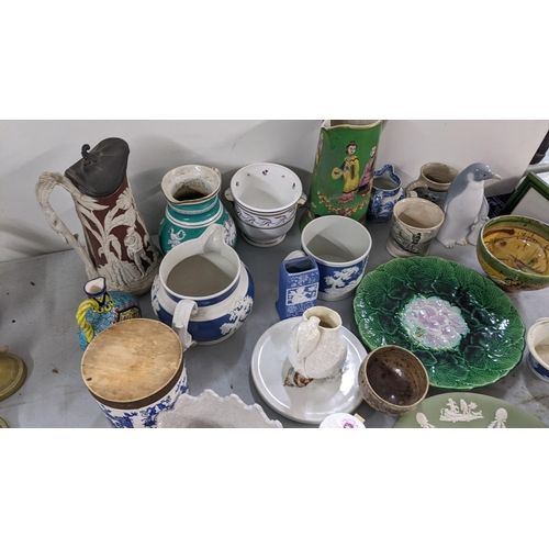 81 - A mixed lot to include a Majolica begonia plate, dale Hall pottery jug and other items
Location:9.2