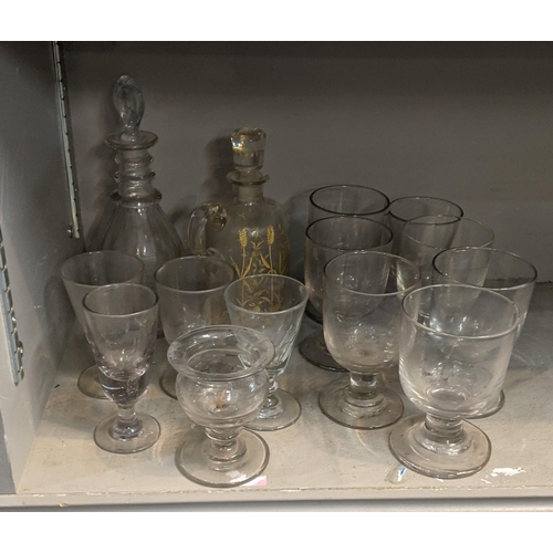 87 - Glassware to include two decanters including a Georgian example together with 19th century and later... 