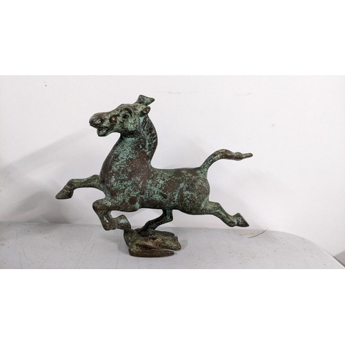 91 - A Chinese bronze ornament flying horse of Gansu, modelled upon a flying swallow
Location:2.1