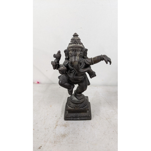 93 - Two Indian bronze ornaments to include Ganesha and one other
Location:9.2