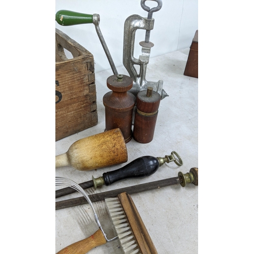 96 - A mixed lot to include various wooden chopping boards, treen pepper grinders, and other treen items
... 