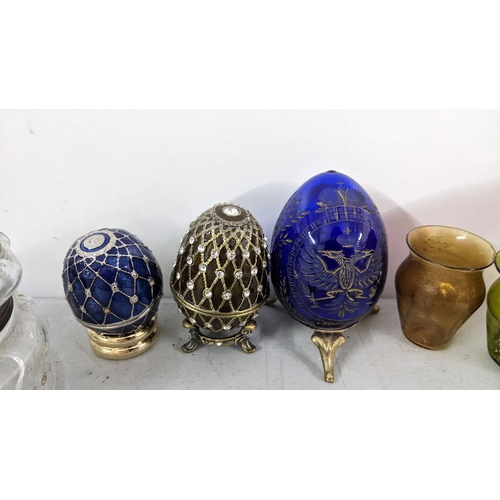 97 - Mixed glassware to include Russian Faberge  blue glass egg on a gilt stand and others together with ... 