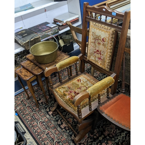 143 - An early 20th century beech framed American rocking chair upholstered in green decorative fabric, an... 