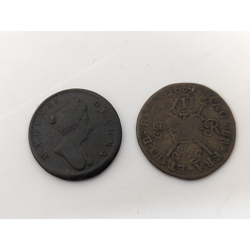 448 - Kingdom of England - a William and Mary undated 'Model Farthing', along with a James II 'Gun Money' ... 