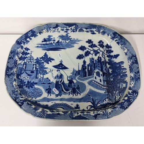 301 - An early 19th century blue and white Minton Queen of Sheba pattern meat plate with gravy reservoir, ... 