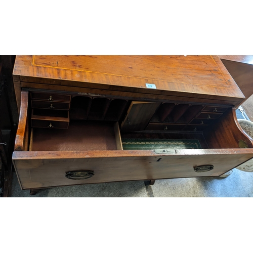 373 - A George III mahogany secretaire chest having a fitted interior above three drawers and boxwood inla... 